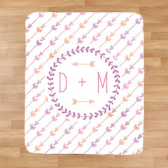 Blanket with arrows and initials